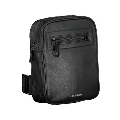 Shoulder Bag by Calvin Klein for men in polyester & polyethylene black presents a statuesque silhouette, showcasing a secure magnetic and statuesque external-pockets & internal-pockets with versatile shoulder-strap & adjustable-strap for a sophisticated look.