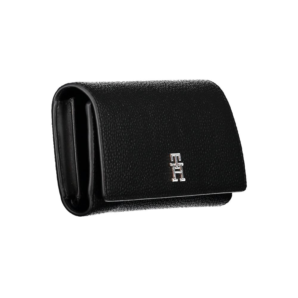 Cardholder Wallet by Tommy Hilfiger for women in polyethylene faux leather black showcases a refined silhouette, artfully detailed with the signature style of the Polyethylene Faux Leather Cardholder Wallet and functional card-organization coin-purse.