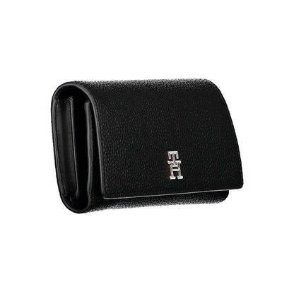 Cardholder Wallet by Tommy Hilfiger for women in polyethylene faux leather black showcases a refined silhouette, artfully detailed with the signature style of the Polyethylene Faux Leather Cardholder Wallet and functional card-organization coin-purse.