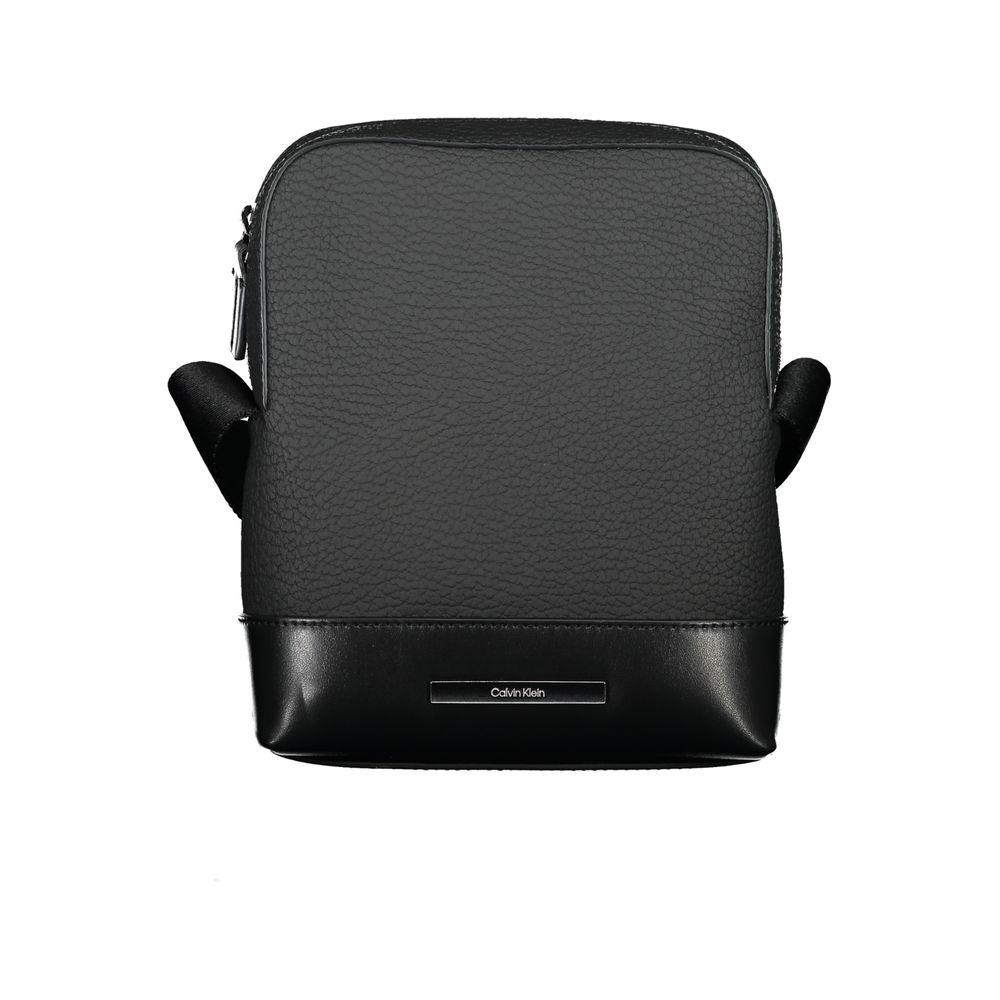 Shoulder Bag by Calvin Klein for men in polyester & polyethylene black presents a statuesque silhouette, showcasing a secure zipper and statuesque external-pockets & internal-pockets with versatile shoulder-strap & adjustable-strap for a sophisticated look.