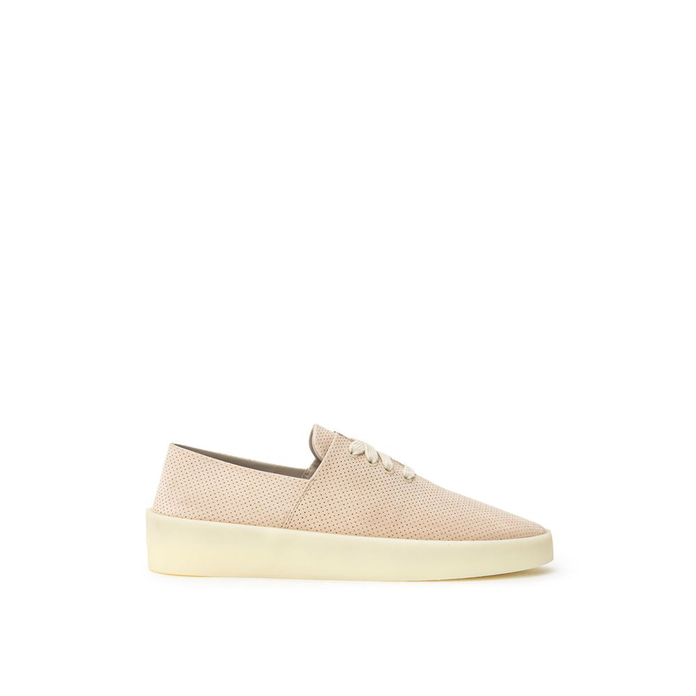 Sneakers by Fear Of God for men in suede leather & rubber beige presents a sumptuous silhouette, artfully capturing the essence of the Men's Low Top Suede Leather & Rubber Sneakers with its sumptuous low-top style design.