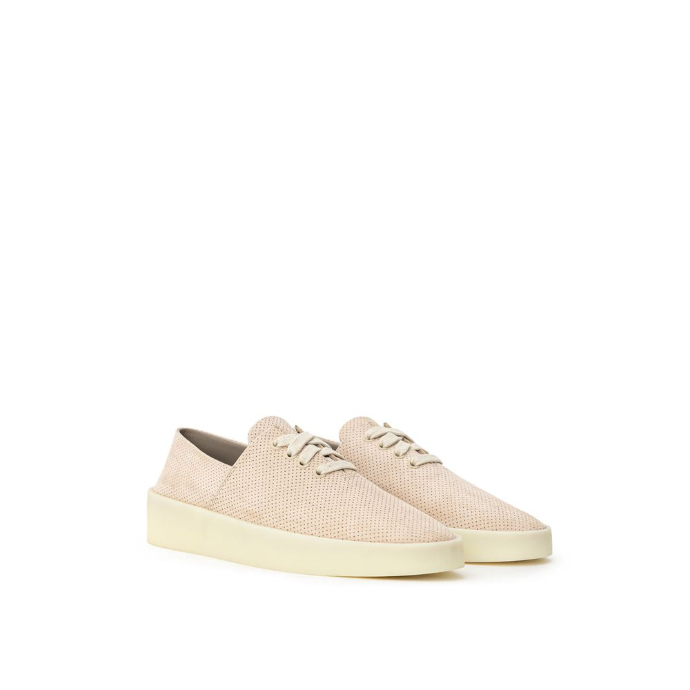 Sneakers by Fear Of God for men in suede leather & rubber beige presents a impeccable silhouette as Men's Low Top Suede Leather & Rubber Sneakers, expertly defined by a impeccable low-top style for a impeccable, high-fashion look.