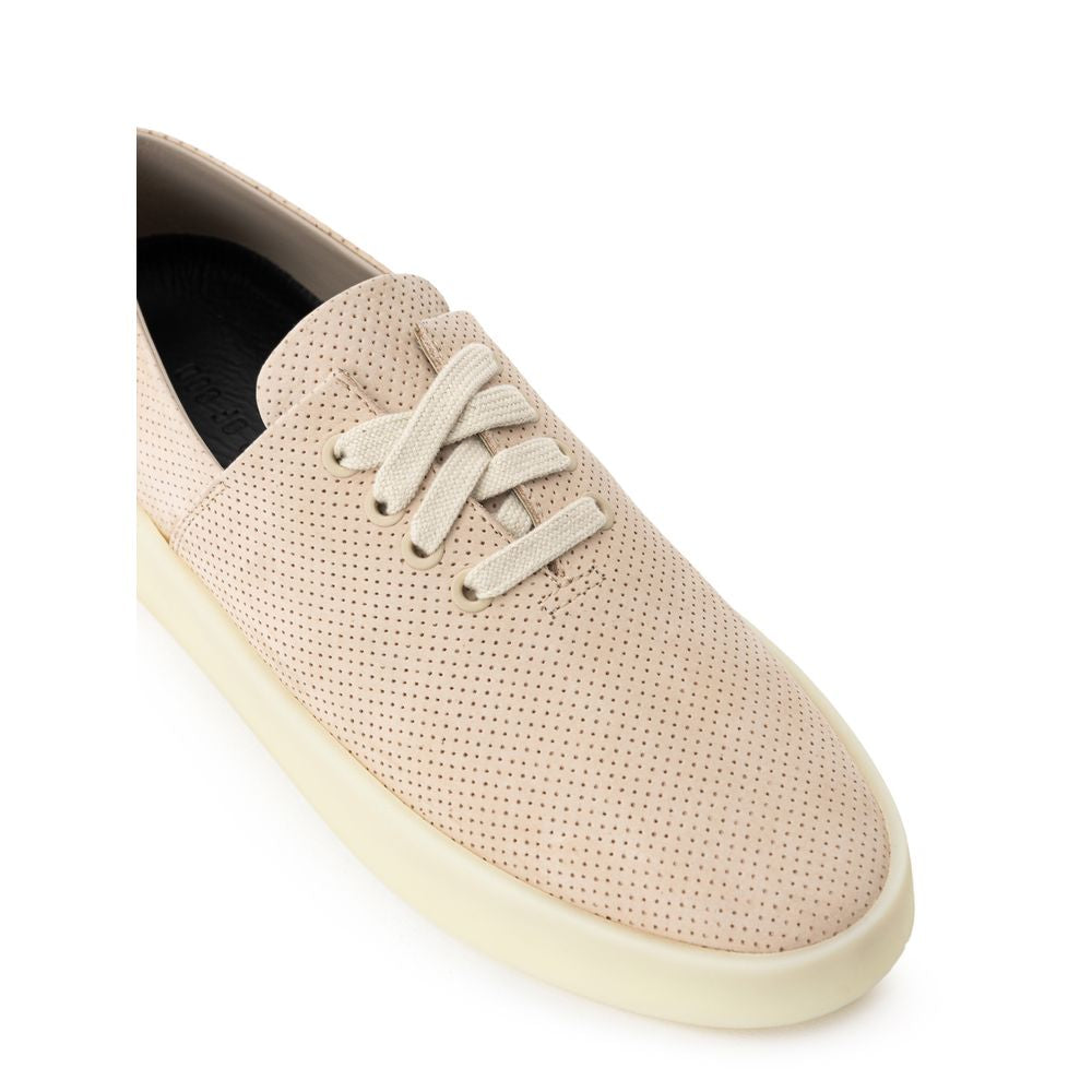 Sneakers by Fear Of God for men in suede leather & rubber beige presents a on trend silhouette from the Men's Low Top Suede Leather & Rubber Sneakers collection, showcasing a on trend low-top style for an elevated aesthetic.