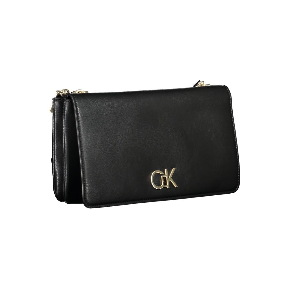 Small Shoulder Convertible Handbag by Calvin Klein for women in polyester faux leather black features an exquisite silhouette, showcasing a secure zipper, ample built-in-compartments & internal-pockets, and exquisite shoulder-strap & adjustable-strap for a sophisticated finish.