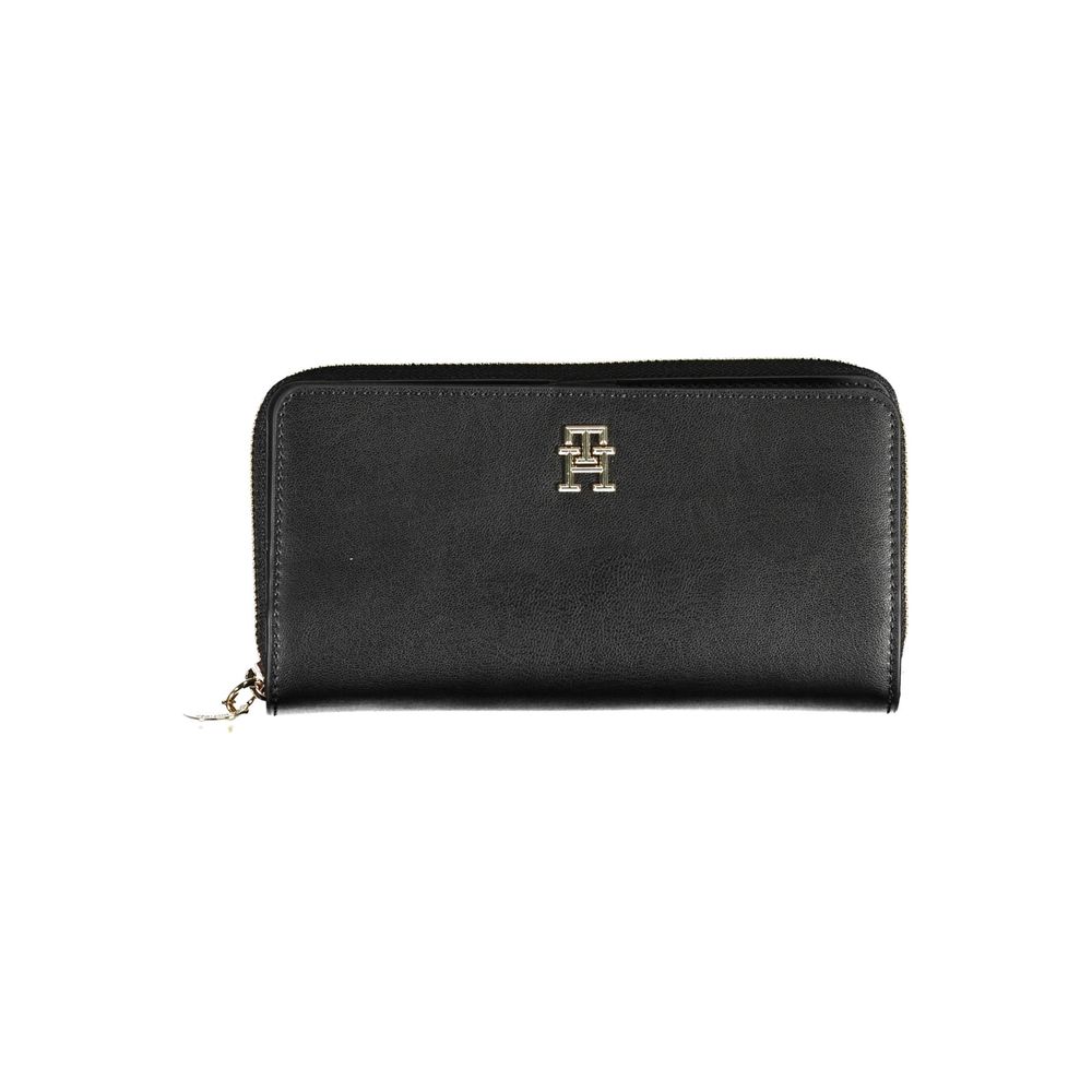 Wallet by Tommy Hilfiger for women in polyethylene faux leather black showcases a refined silhouette, artfully capturing the essence of the refined Polyethylene Faux Leather Wallet design with functional compact-design.