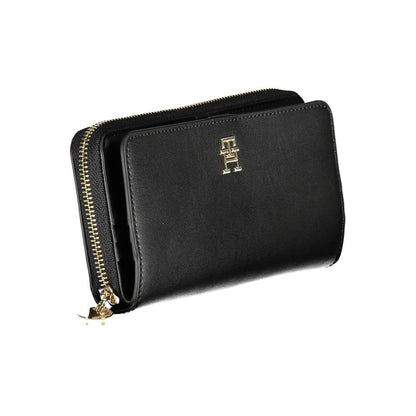 Wallet by Tommy Hilfiger for women in polyethylene faux leather black showcases a refined silhouette, artfully detailed with the signature style of the Polyethylene Faux Leather Wallet and functional compact-design.