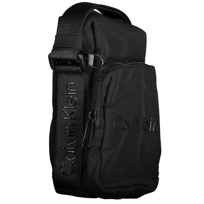 Shoulder Bag by Calvin Klein for men in nylon polyester & polyethylene black features a effortless sophistication silhouette, secured by a zipper with ample external-pockets and versatile shoulder-strap & adjustable-strap for a effortless sophistication finish.