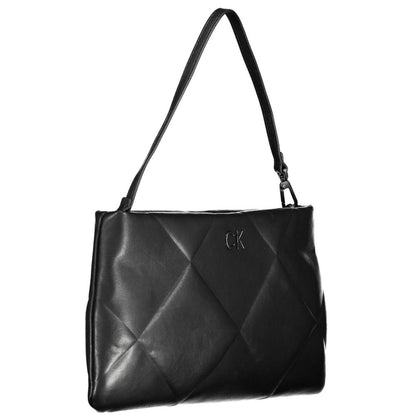 This Handbag by Calvin Klein for women in polyester and black presents a sculptural silhouette featuring a secure , ample internal-pockets, and versatile handle for a sculptural finish.