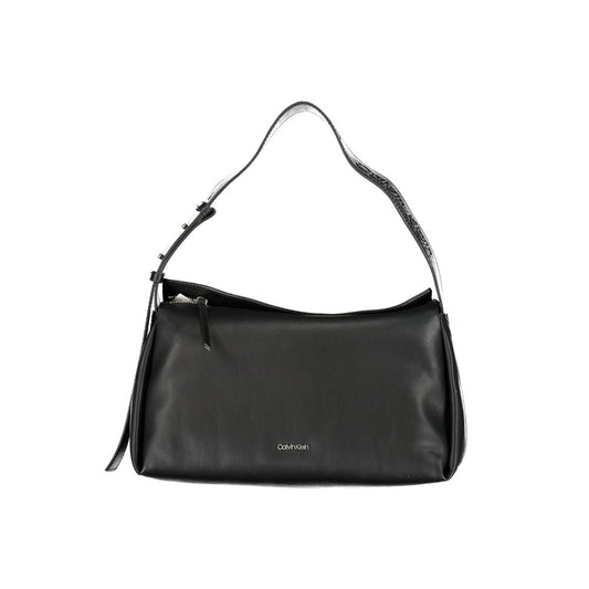 Convertible Handbag by Calvin Klein for women in polyester faux leather black features an exquisite silhouette, showcasing a secure zipper, ample internal-pockets, and versatile shoulder-strap, adjustable-strap & handle for exquisite style.