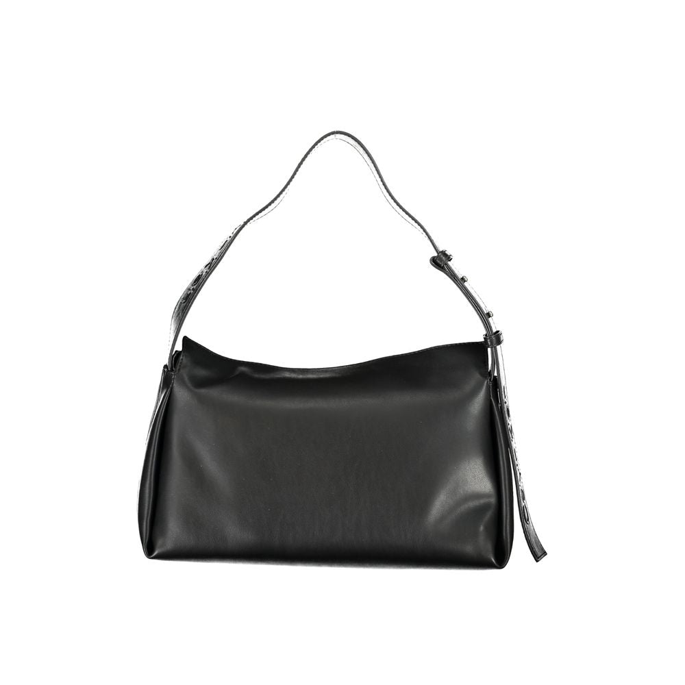 Convertible Handbag by Calvin Klein for women in polyester faux leather black presents a enviable design with a secure zipper, ample internal-pockets, and versatile shoulder-strap, adjustable-strap & handle for a sophisticated look.