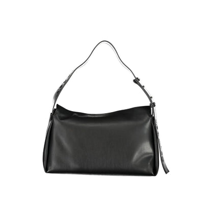 Convertible Handbag by Calvin Klein for women in polyester faux leather black presents a enviable design with a secure zipper, ample internal-pockets, and versatile shoulder-strap, adjustable-strap & handle for a sophisticated look.