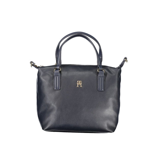 This Handbag by Tommy Hilfiger for women in polyester and blue presents a sculptural silhouette featuring a secure zipper, ample internal-pockets, and versatile shoulder-strap, handle & adjustable-strap for a sculptural finish.