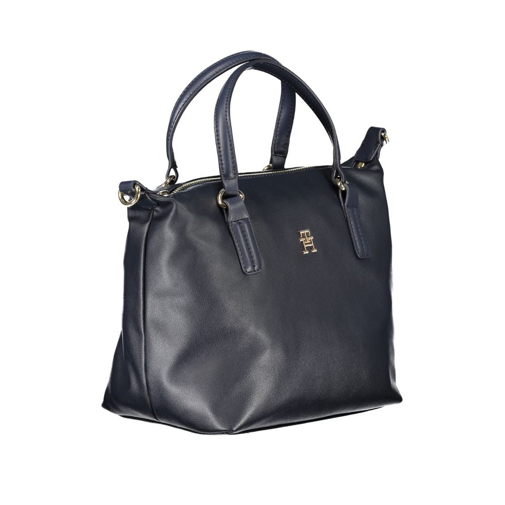 Handbag by Tommy Hilfiger for women in polyester blue features an refined silhouette, showcasing a secure zipper, ample internal-pockets, and versatile shoulder-strap, handle & adjustable-strap for a sophisticated refined aesthetic.