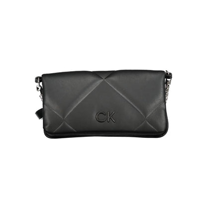 Crossbody Fanny Pack Convertible Handbag by Calvin Klein for women in polyester faux leather black presents a enviable design with a secure magnetic, ample , and versatile crossbody-strap, adjustable-strap, belt-strap & handle for a sophisticated look.