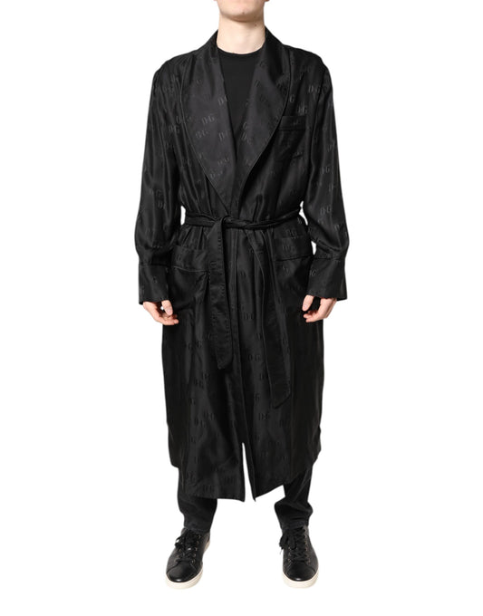 This Jacket by Dolce & Gabbana for men in silk black showcases a magnificent silhouette, meticulously crafted with a distinctive wrap neckline and functional for a magnificent finish.