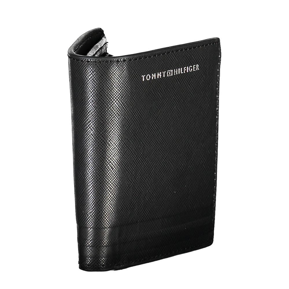 Wallet by Tommy Hilfiger for men in leather black & print showcases a discerning silhouette, artfully capturing the essence of Leather Wallet with its functional coin-purse.