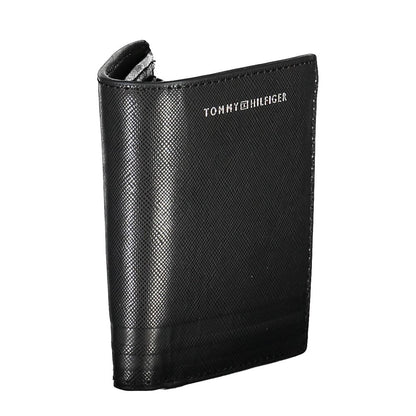 Wallet by Tommy Hilfiger for men in leather black & print showcases a discerning silhouette, artfully capturing the essence of Leather Wallet with its functional coin-purse.