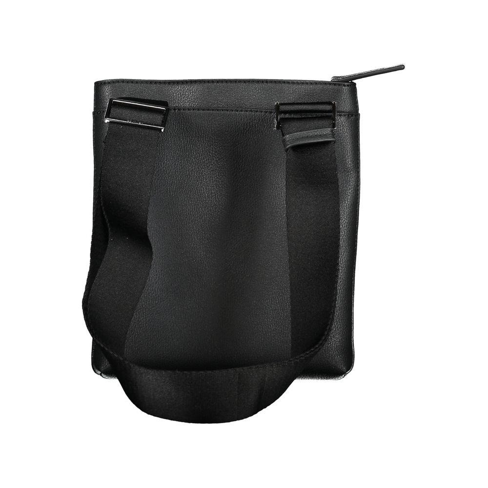 Shoulder Bag by Calvin Klein for men in polyester & polyethylene black features a stately silhouette, showcasing a secure zipper, ample external-pockets & internal-pockets, and stately shoulder-strap & adjustable-strap for a stately finish.
