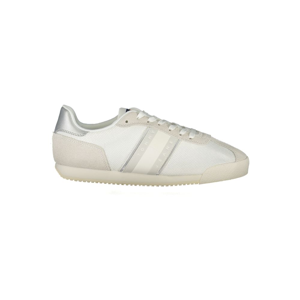 Sneakers by Tommy Hilfiger for women in polyester white presents a sumptuous silhouette from the Essence Women's Fashion Polyester Sneakers collection, showcasing a sumptuous fashion style for an elevated aesthetic.