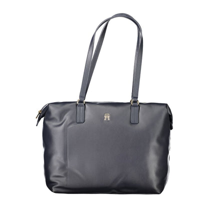 This Shoulder Handbag by Tommy Hilfiger for women in polyester & polyethylene and blue presents a sculptural silhouette featuring a secure zipper, ample , and versatile shoulder-strap & handle for a sculptural finish.