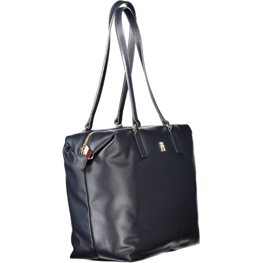 Shoulder Handbag by Tommy Hilfiger for women in polyester & polyethylene blue features an refined silhouette, showcasing a secure zipper, ample , and versatile shoulder-strap & handle for a sophisticated refined aesthetic.