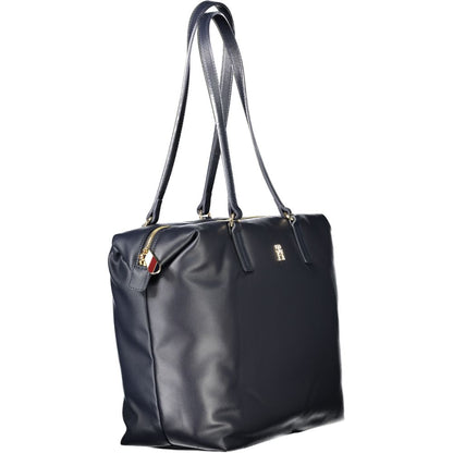 Evening Shoulder Handbag by Tommy Hilfiger for women in polyester & polyurethane blue presents a ornamental silhouette, showcasing a secure zipper, ample internal-pockets, and versatile shoulder-strap & handle for a ornamental finish.