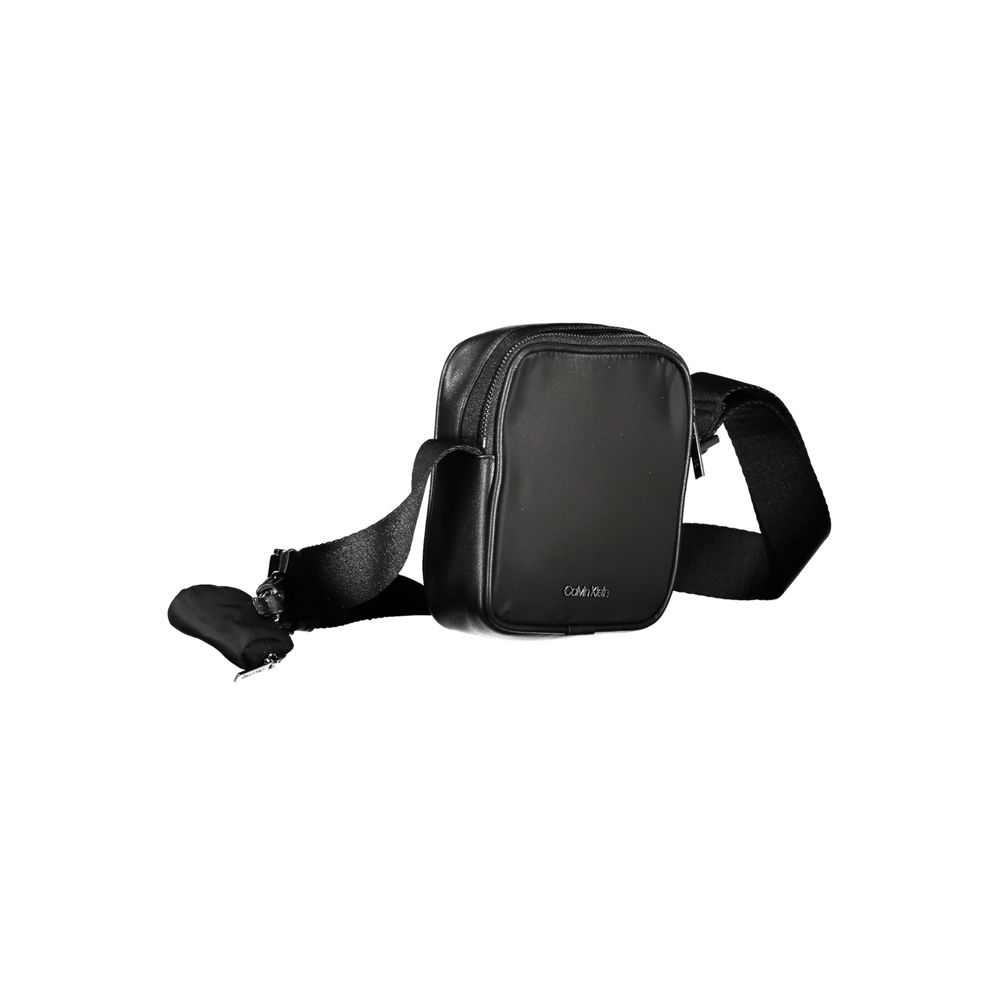 Shoulder Bag by Calvin Klein for men in polyester black presents a statuesque silhouette, showcasing a secure zipper and statuesque removable-pouch, internal-pockets & coin-purse with versatile shoulder-strap & adjustable-strap for a sophisticated look.