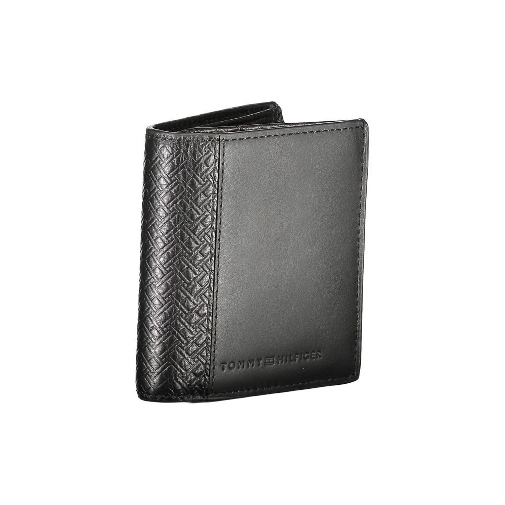 Wallet by Tommy Hilfiger for men in leather black showcases a refined silhouette, artfully capturing the essence of the refined Leather Wallet design with functional coin-purse.