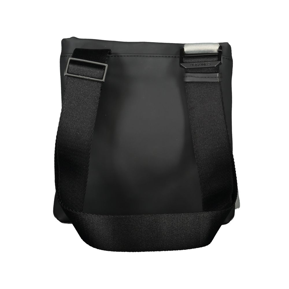 Shoulder Bag by Calvin Klein for men in polyester & polyethylene black features a stately silhouette, showcasing a secure zipper, ample external-pockets & internal-pockets, and stately shoulder-strap & adjustable-strap for a stately finish.