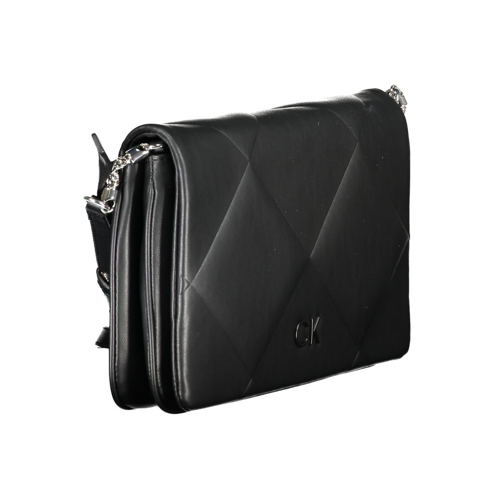 Quilted Shoulder Handbag by Calvin Klein for women in polyester faux leather black features a refined silhouette, showcasing a secure snap, organized built-in-compartments & cardholder, and versatile shoulder-strap & adjustable-strap for a refined finish.