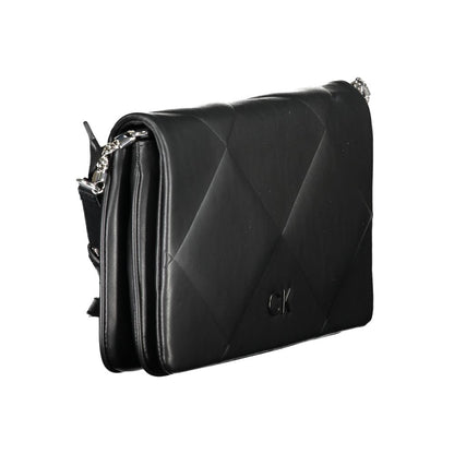 Quilted Shoulder Handbag by Calvin Klein for women in polyester faux leather black features a refined silhouette, showcasing a secure snap, organized built-in-compartments & cardholder, and versatile shoulder-strap & adjustable-strap for a refined finish.