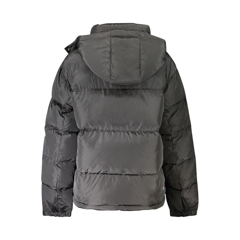 Hooded Overcoat by Tommy Hilfiger for women in black features an voluminous silhouette, showcasing distinct pockets & hooded and a voluminous for a truly voluminous aesthetic.