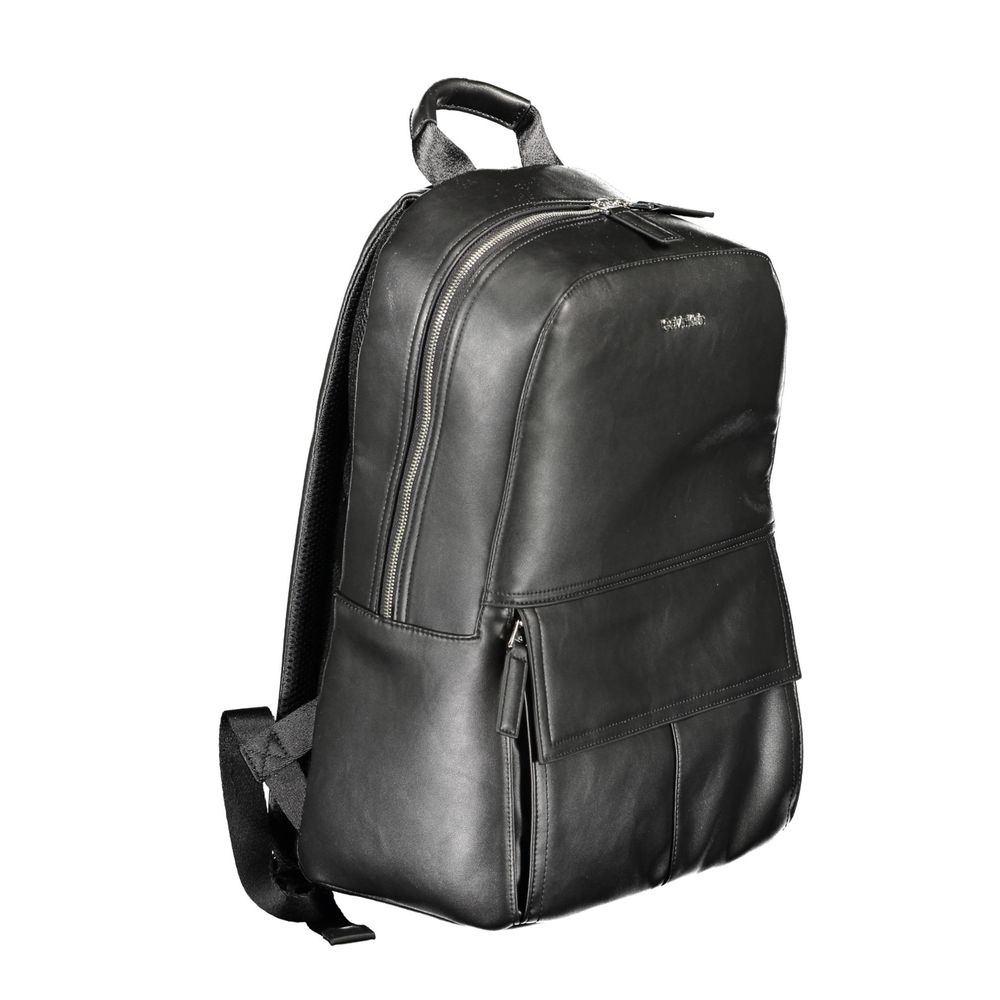 Backpack by Calvin Klein for men in polyester & polyethylene black features a stately Explorer Polyester & Polyethylene Backpack design, showcasing a secure , ample internal-pockets & laptop-compartment, and versatile handle, backpack-strap & adjustable-strap for a stately finish.