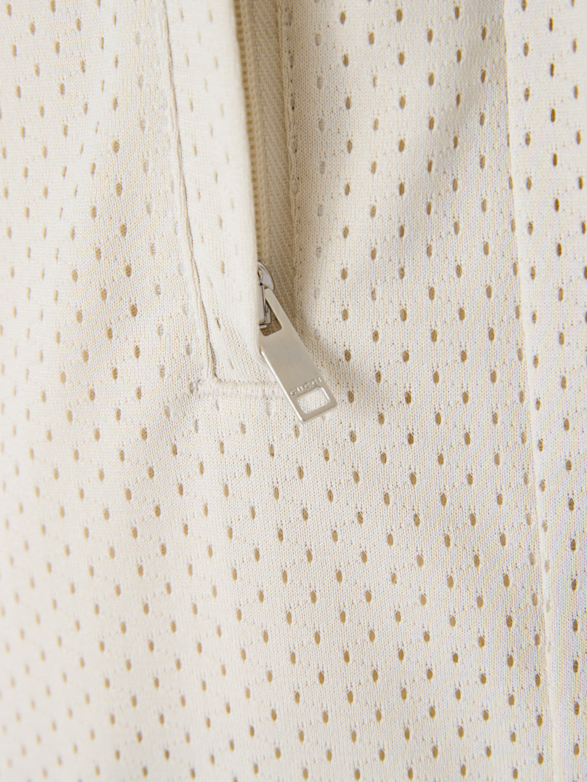 Shorts by Gucci for men in polyester cream features a architectural silhouette, showcasing a architectural and short defined by a sophisticated for a premium, elevated aesthetic.