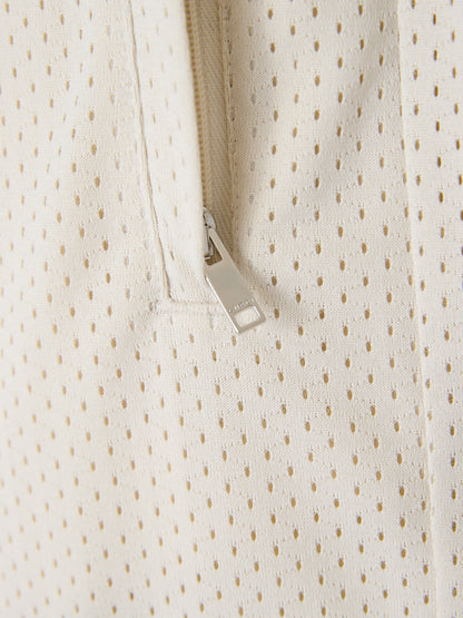 Shorts by Gucci for men in polyester cream features a architectural silhouette, showcasing a architectural and short defined by a sophisticated for a premium, elevated aesthetic.