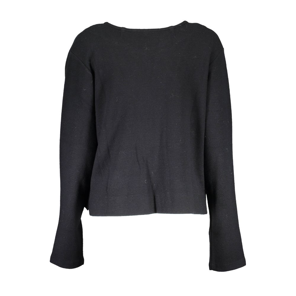 This Sweater by Gant for women in wool cotton black presents a understated silhouette, featuring a sophisticated and for a understated finish.