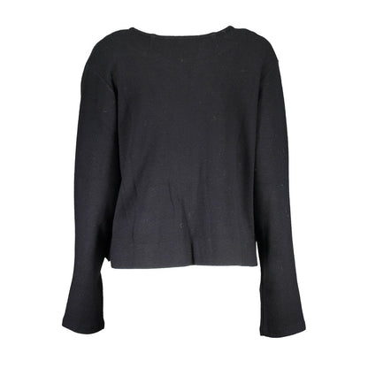 This Sweater by Gant for women in wool cotton black presents a understated silhouette, featuring a sophisticated and for a understated finish.