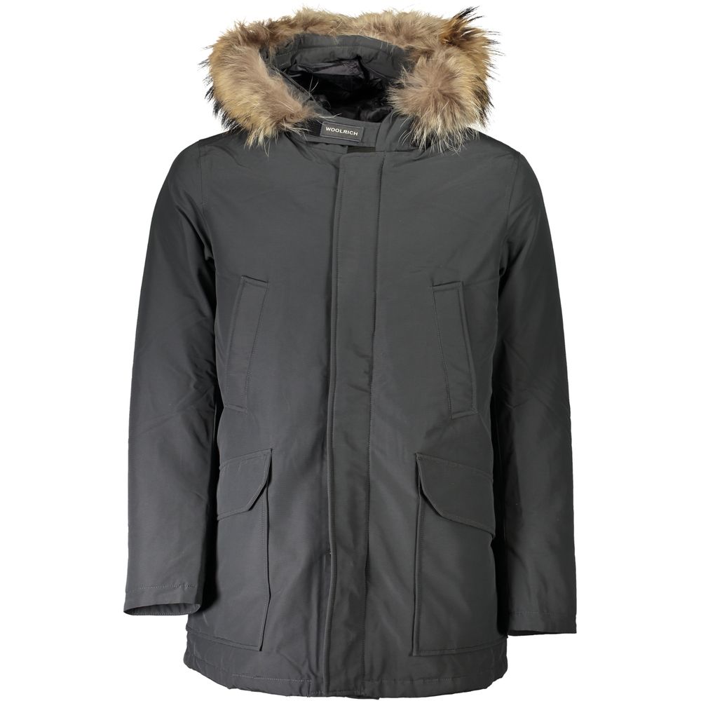 This Hooded Jacket by Woolrich for men in cotton & fur gray showcases a magnificent silhouette, meticulously crafted with a distinctive hooded neckline and functional pockets & hooded for a magnificent finish.