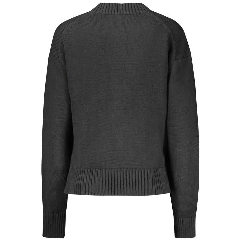 Sweatshirt by Calvin Klein for women in wool cotton black features an provocated silhouette, detailed with a provocated and a refined for a sophisticated aesthetic.