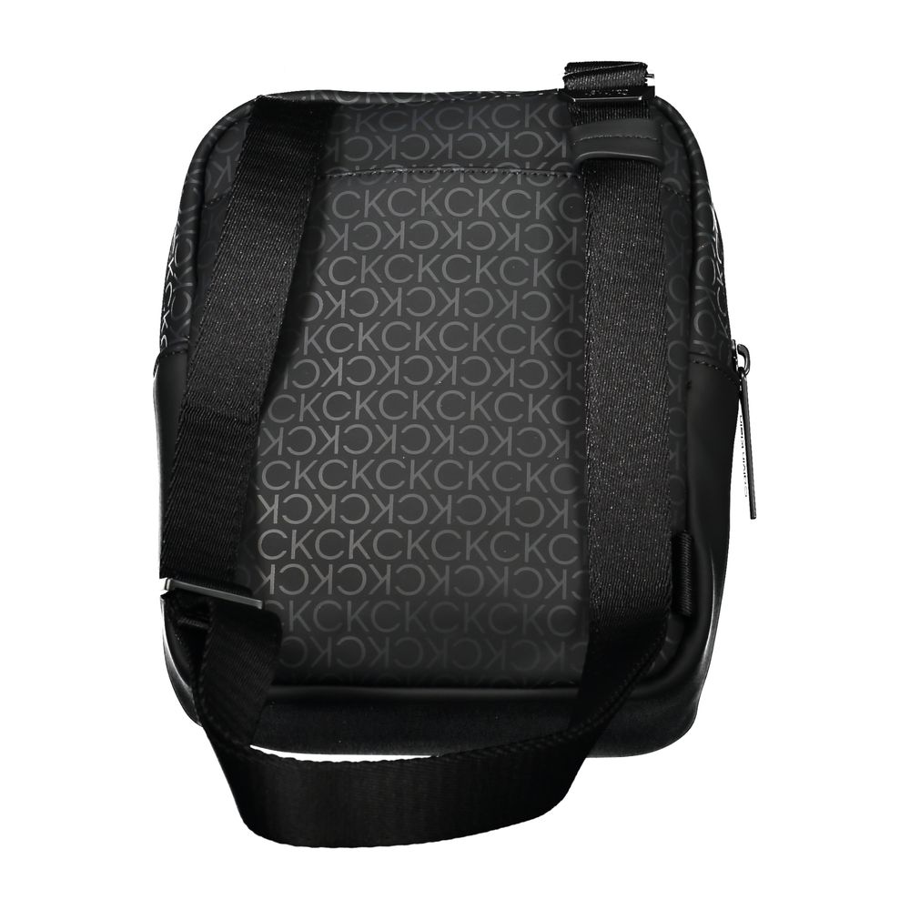 Shoulder Bag by Calvin Klein for men in polyester & polyethylene black features a effortless chic silhouette with a secure , ample external-pockets & internal-pockets, and versatile shoulder-strap & adjustable-strap for a effortless chic finish.