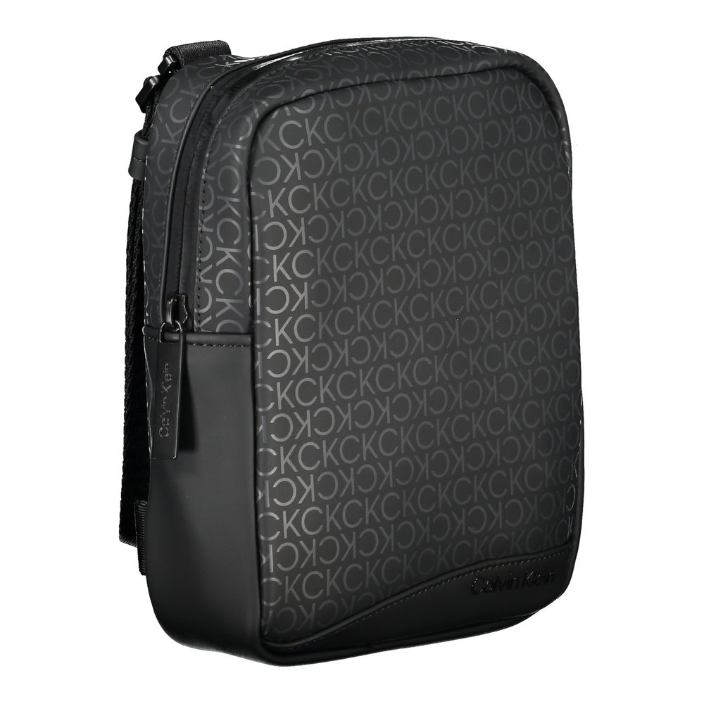 Shoulder Bag by Calvin Klein for men in polyester & polyethylene black features an effortlessly chic silhouette with a secure , ample external-pockets & internal-pockets, and versatile shoulder-strap & adjustable-strap for effortlessly chic everyday luxury.