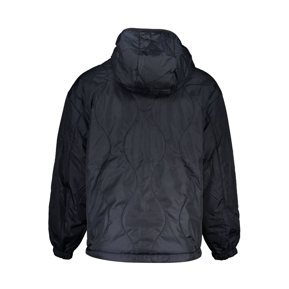 Hooded Windbreaker Jacket by Tommy Hilfiger for men in polyester blue, red & white features an perennial silhouette with a refined hooded neckline and perennial pockets, hooded & windproof for a sophisticated weather-resistant look.