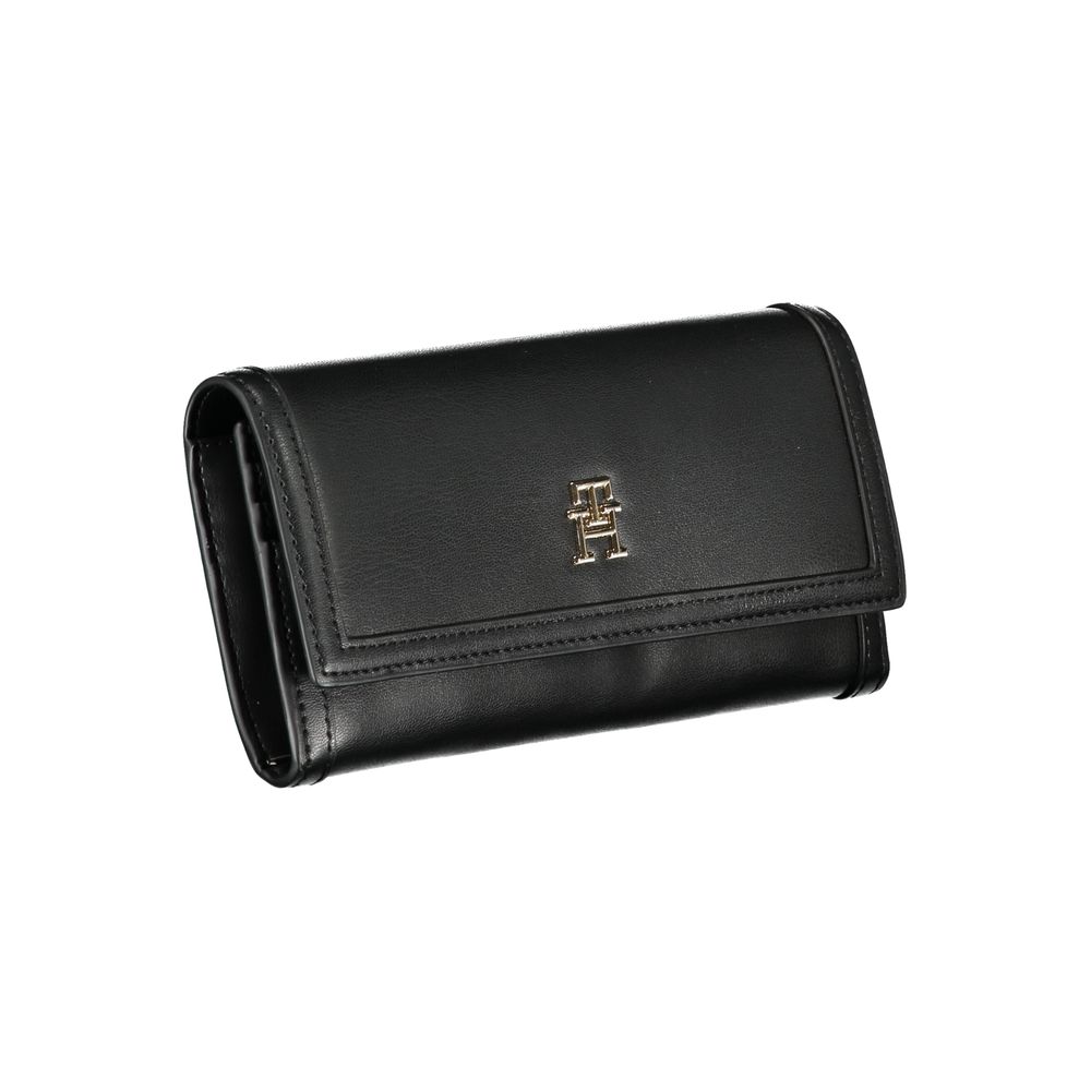 Cardholder Wallet by Tommy Hilfiger for women in polyethylene black showcases a discerning silhouette, artfully capturing the essence of Polyethylene Cardholder Wallet with its functional card-organization coin-purse.