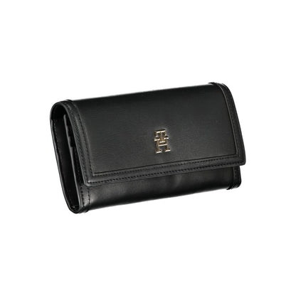 Cardholder Wallet by Tommy Hilfiger for women in polyethylene black showcases a discerning silhouette, artfully capturing the essence of Polyethylene Cardholder Wallet with its functional card-organization coin-purse.