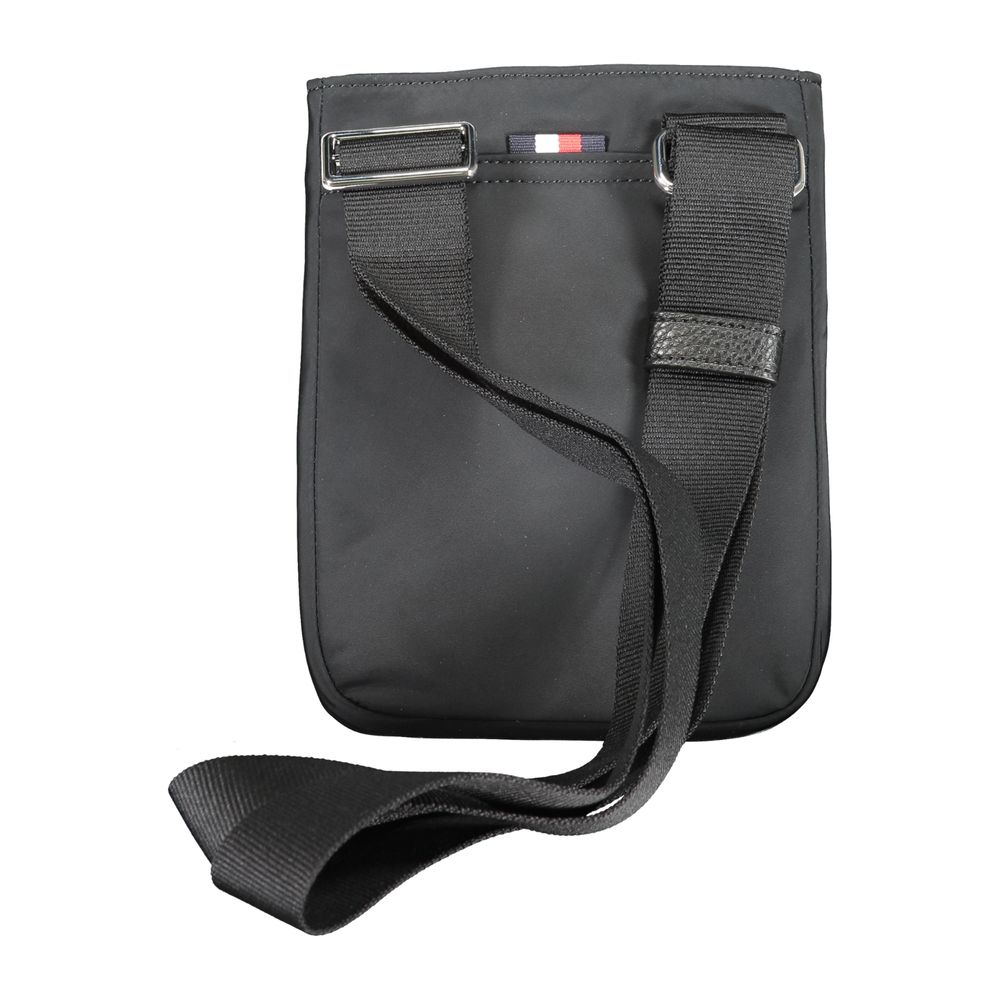 Shoulder Bag by Tommy Hilfiger for men in polyester black features a statuesque silhouette, showcasing a secure zipper and statuesque external-pockets & internal-pockets with versatile shoulder-strap & adjustable-strap for a statuesque finish.
