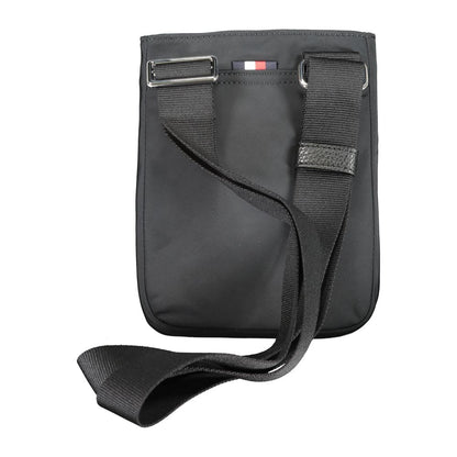 Shoulder Bag by Tommy Hilfiger for men in polyester black features a statuesque silhouette, showcasing a secure zipper and statuesque external-pockets & internal-pockets with versatile shoulder-strap & adjustable-strap for a statuesque finish.