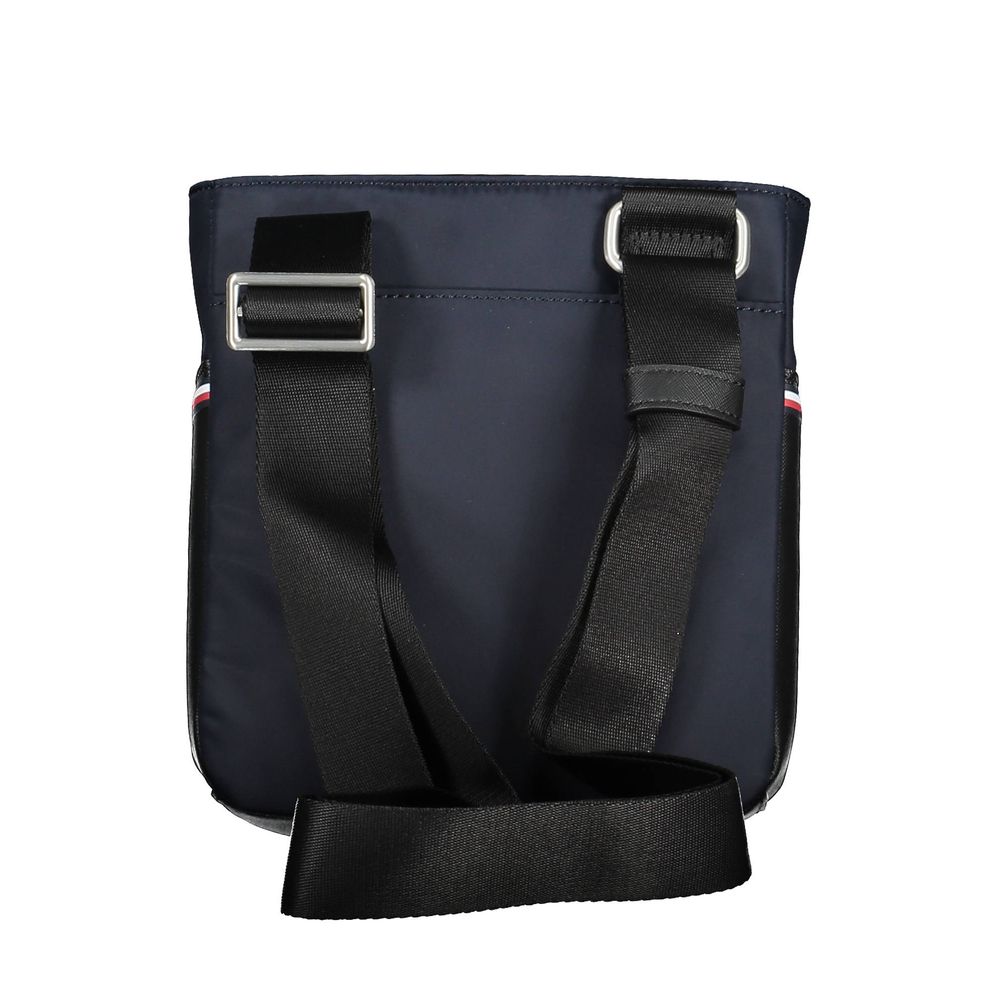 Shoulder Bag by Tommy Hilfiger for men in polyester & polyethylene blue features a statuesque silhouette, showcasing a secure zipper and statuesque external-pockets & internal-pockets with versatile shoulder-strap & adjustable-strap for a statuesque finish.