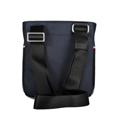 Shoulder Bag by Tommy Hilfiger for men in polyester & polyethylene blue features a statuesque silhouette, showcasing a secure zipper and statuesque external-pockets & internal-pockets with versatile shoulder-strap & adjustable-strap for a statuesque finish.