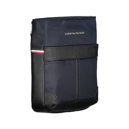 Shoulder Bag by Tommy Hilfiger for men in polyester & polyethylene blue presents a statuesque silhouette, showcasing a secure zipper and statuesque external-pockets & internal-pockets with versatile shoulder-strap & adjustable-strap for a sophisticated look.