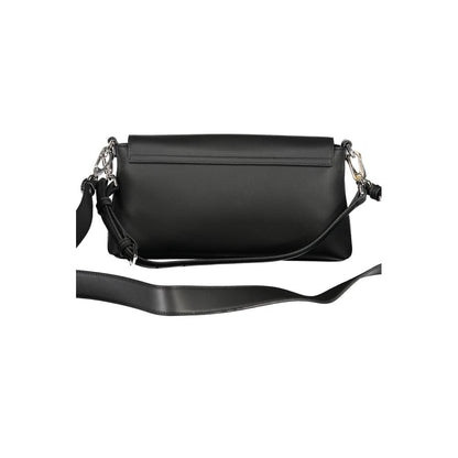 2-in-1 Shoulder & Crossbody Convertible Handbag by Calvin Klein for women in polyester faux leather black features a refined silhouette, showcasing a secure snap & fold-over and refined cardholder with versatile crossbody-strap, shoulder-strap, adjustable-strap & handle for a refined finish.